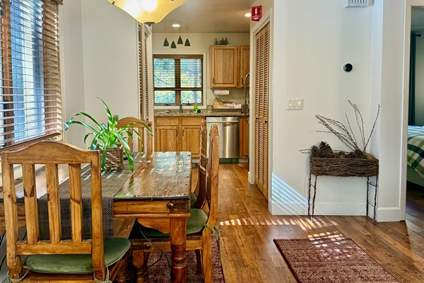 Layout flows seamlessly from the living room through the dining area to kitchen