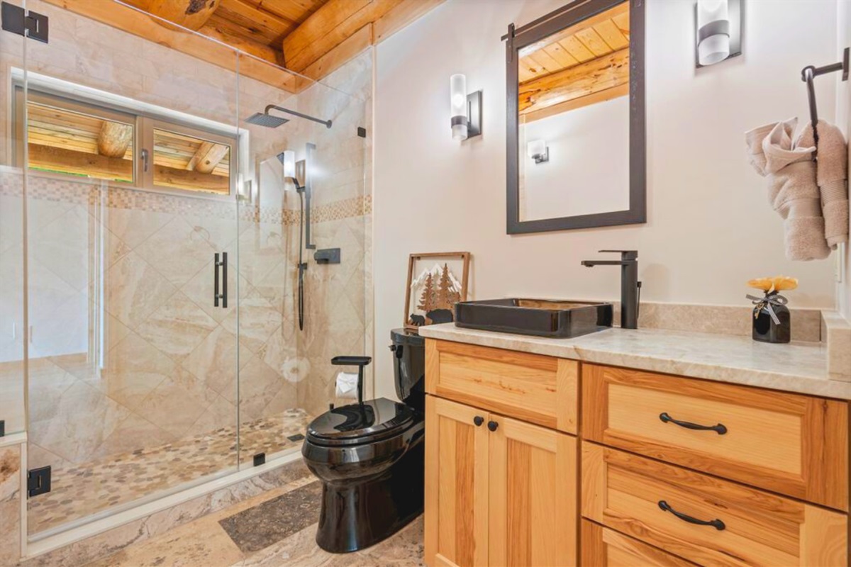 Shared full bathroom just steps from the main-floor bedroom.