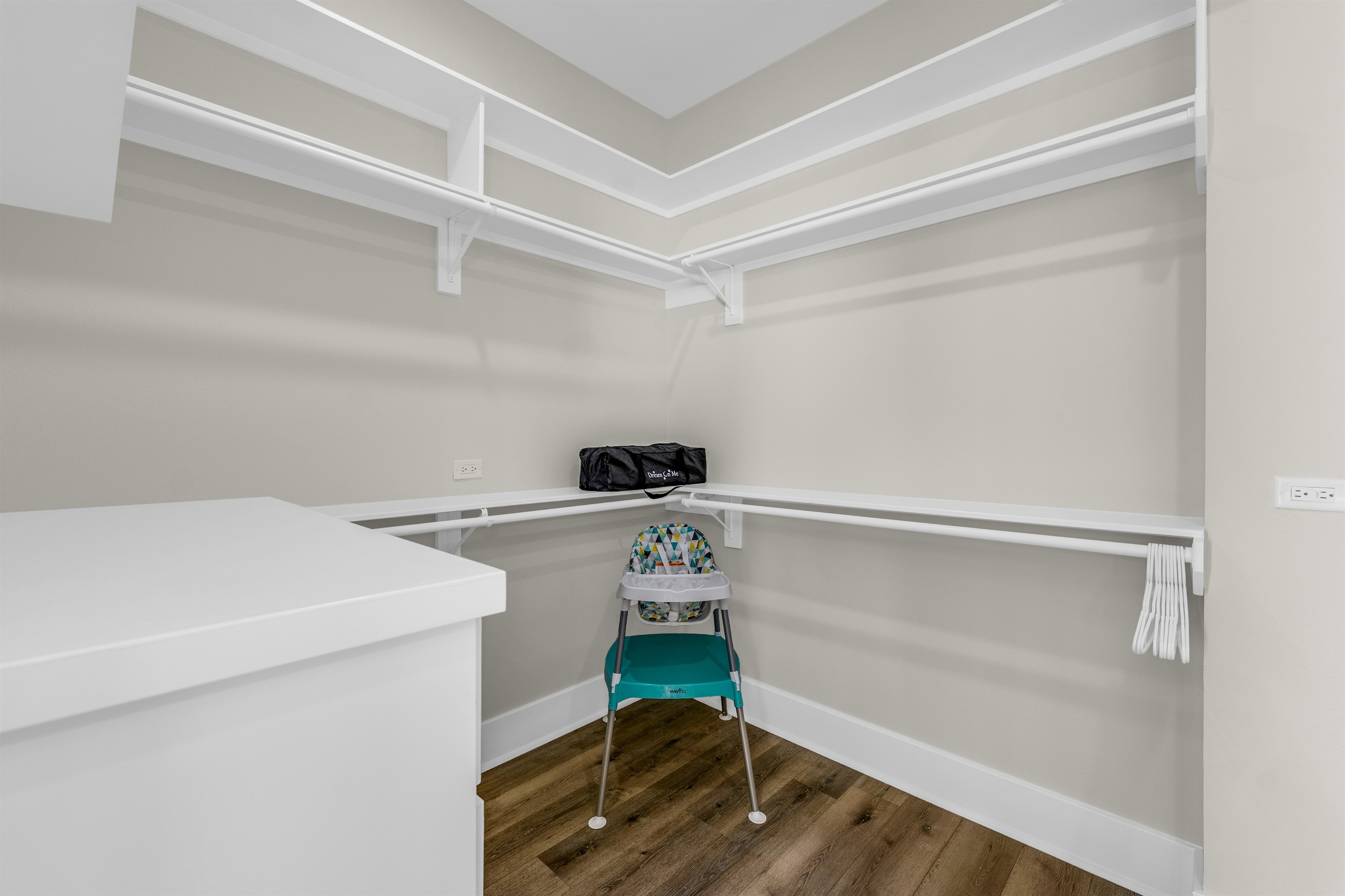 Costa Cristal Primary Bedroom: Convenient storage space in the primary suite, complete with a Pack ’n Play and high chair to keep your stay family-friendly and comfortable.