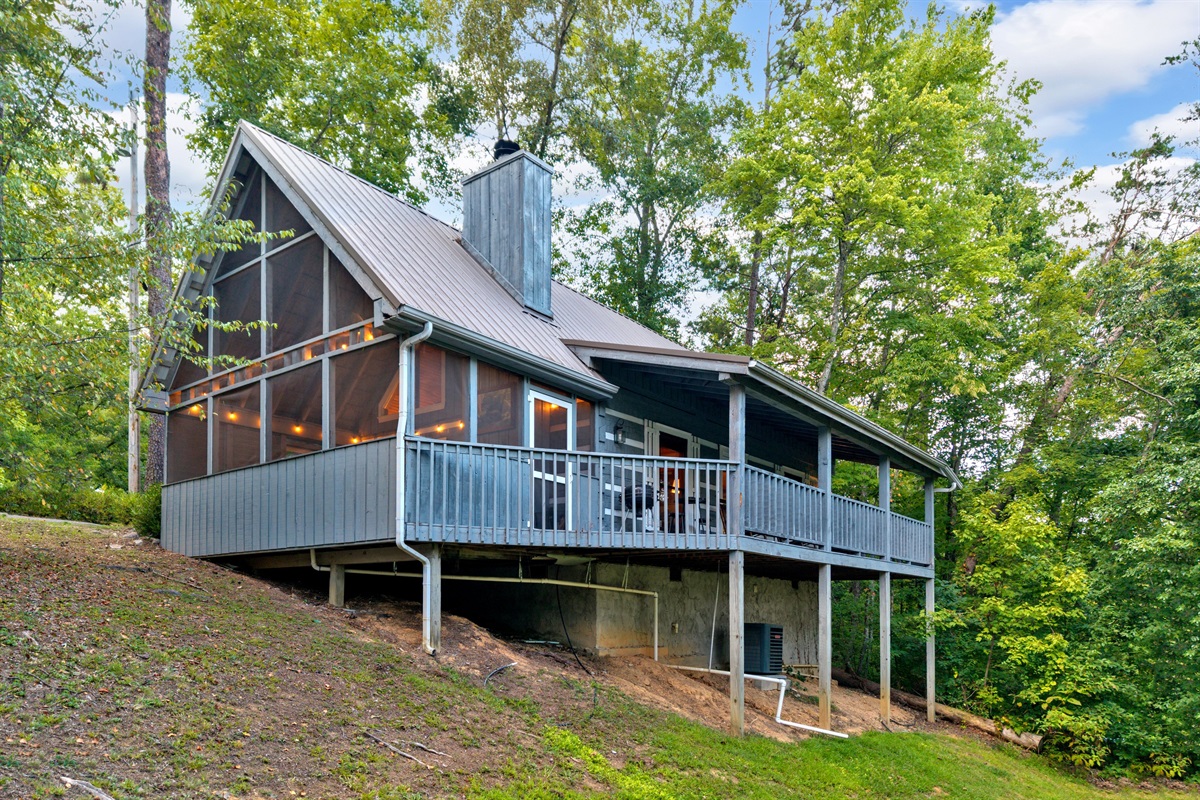 Romantic cabin surrounded by trees — your Smoky Mountain getaway