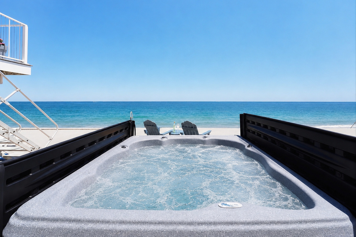 Unwind in the private hot tub while taking in sweeping ocean views.