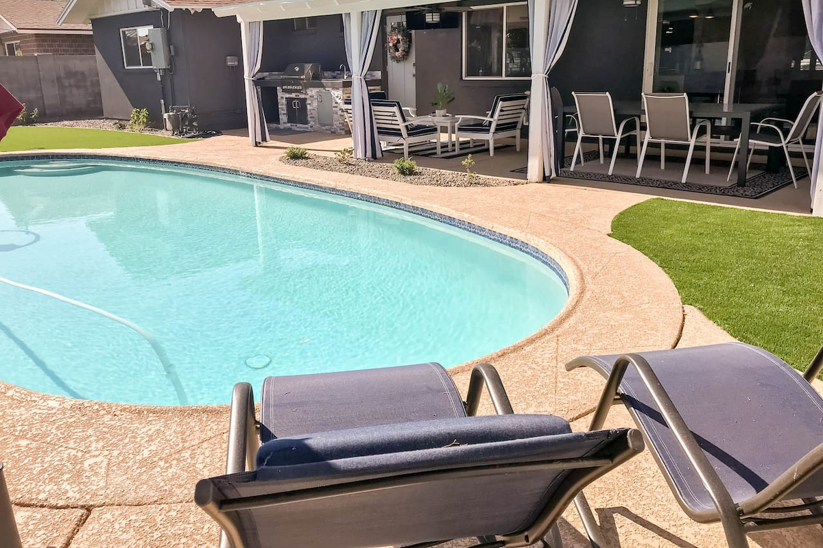 Pool seating and grass!; patio with TV!