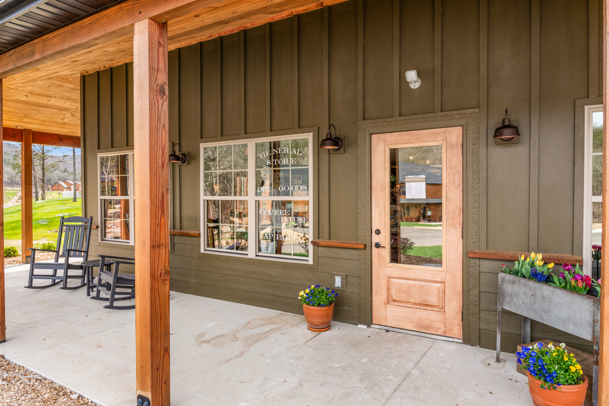 Rock away the afternoon on the covered porch, coffee in hand and timber all around.