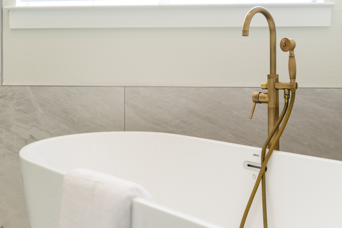 A deep soaking tub invites you to unwind after a day of Hill Country adventures.