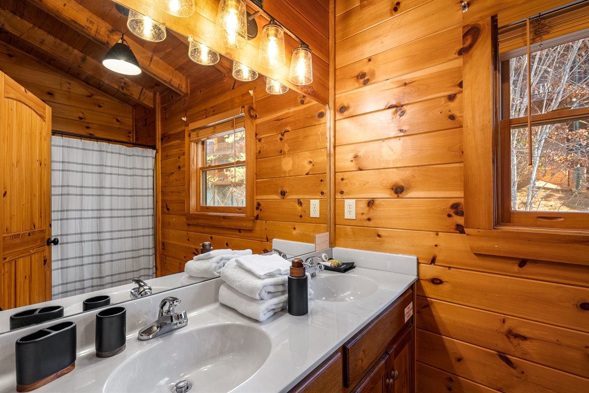 Clean, well-appointed bathrooms stocked for convenience and comfort.