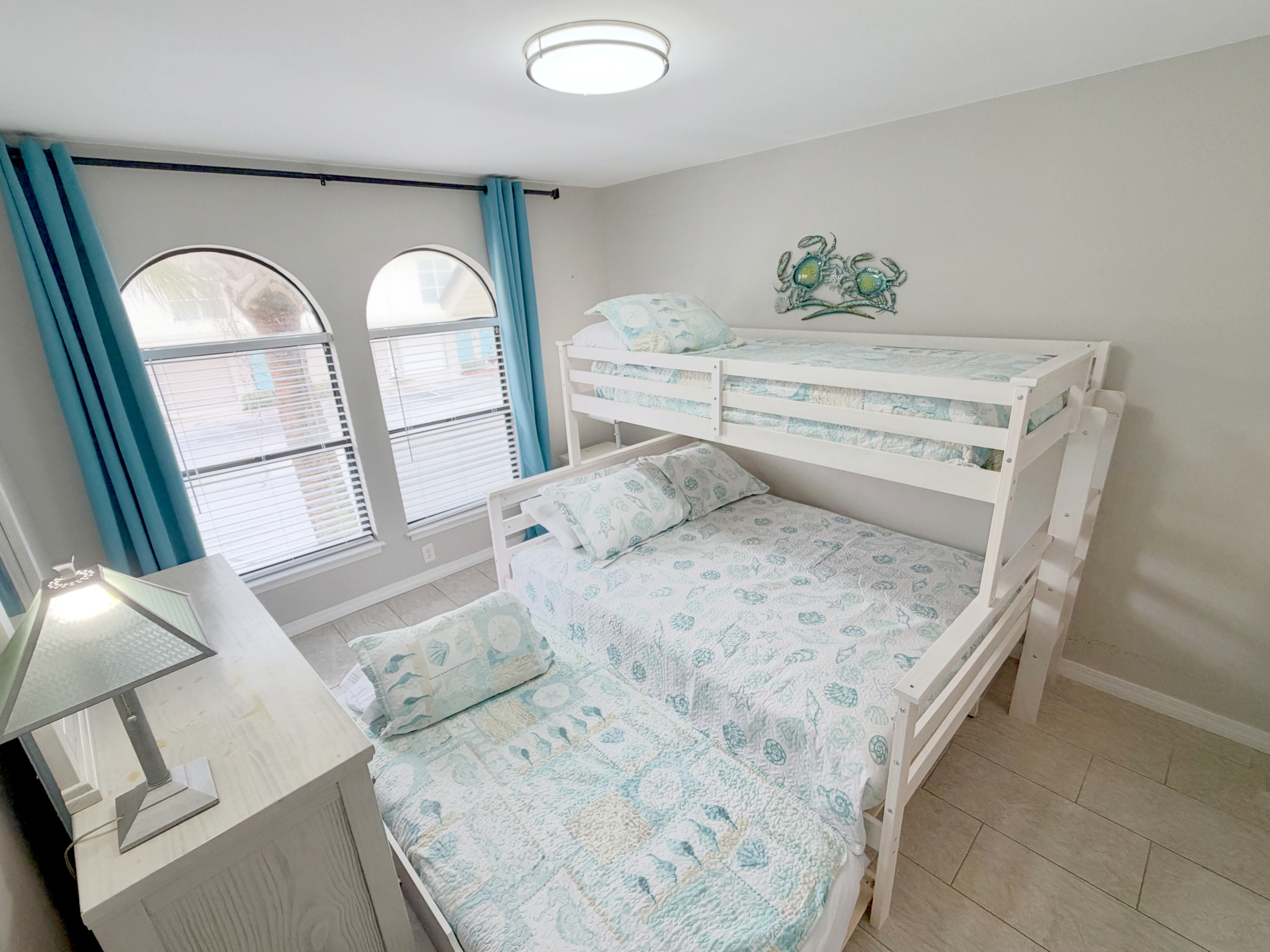 Secondary bedroom with queen/twin bunk bed. There is an additional trundle bed also.