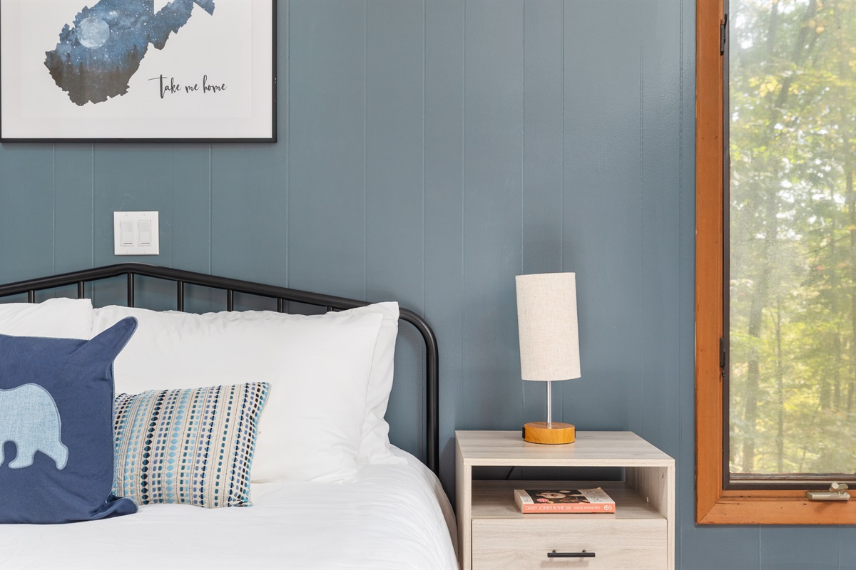 Relax and recharge in this spacious Queen bedroom, with added blankets, pillows, and fitness gear to start your day right.