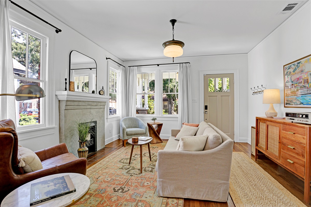 Oversized windows fill the room with Savannah sunshine, making it the perfect place to lounge, read, or recharge.