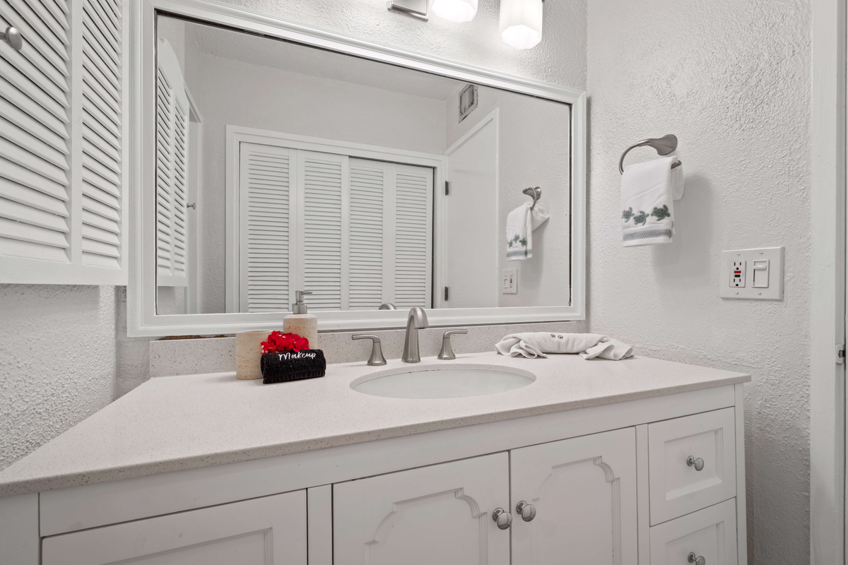 Bright, clean bathroom with modern finishes and thoughtful touches.