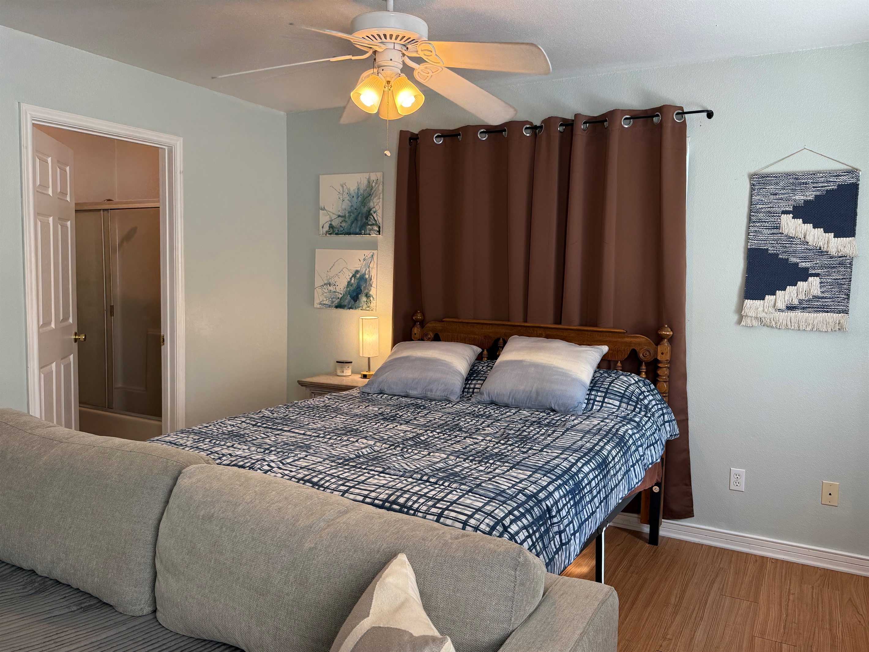 Cozy bed with fresh linens for restful nights.