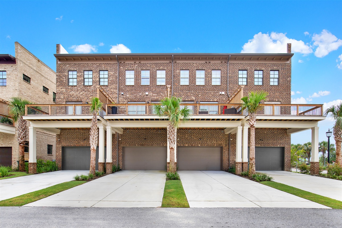 Exterior with garage and patio on 2nd floor