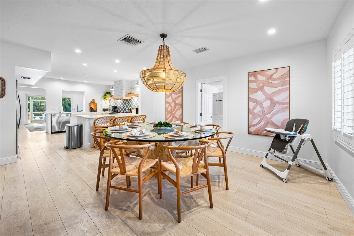Gather 'round! Our bright and airy dining area comfortably seats six, perfect for shared meals and memorable conversations, right off the kitchen.