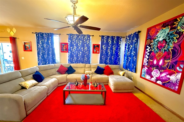 Kick Back on the Plush Couch in the Cozy Living Room