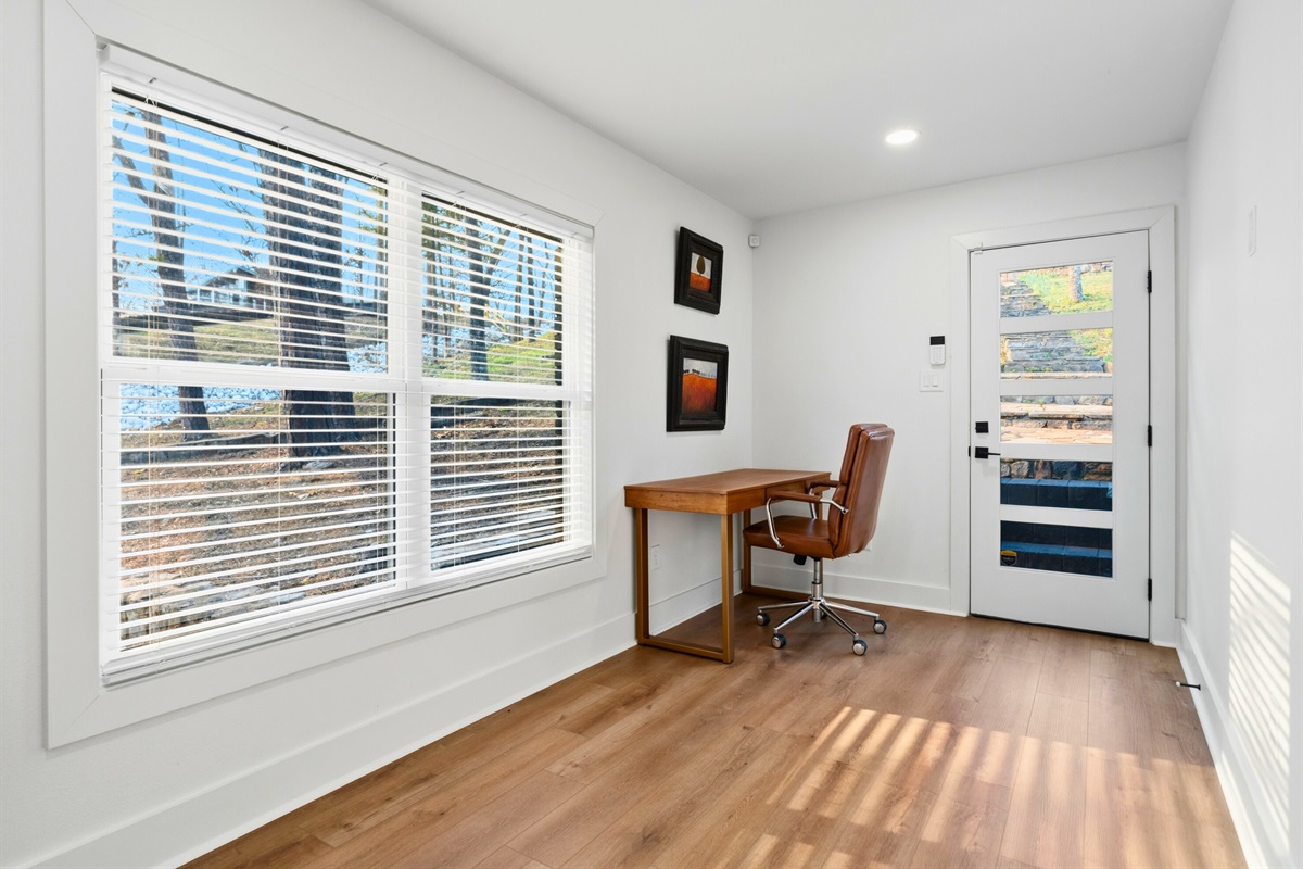 Large windows brighten this quiet office space, creating a peaceful space filled with natural light throughout the day.