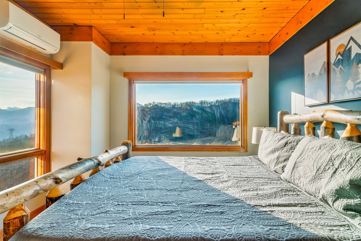 Upstairs King bedroom with windows to relax and enjoy the views