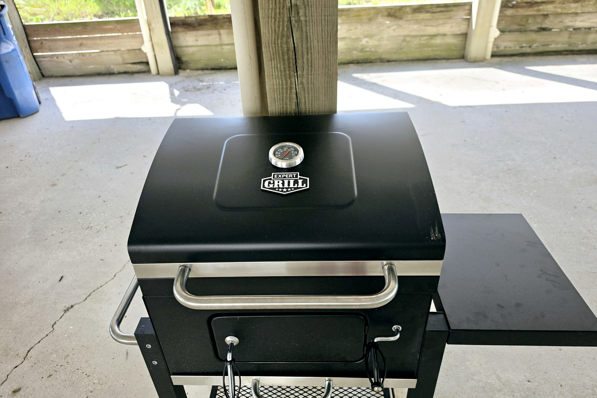 Nest side – Grill in the covered area under the home