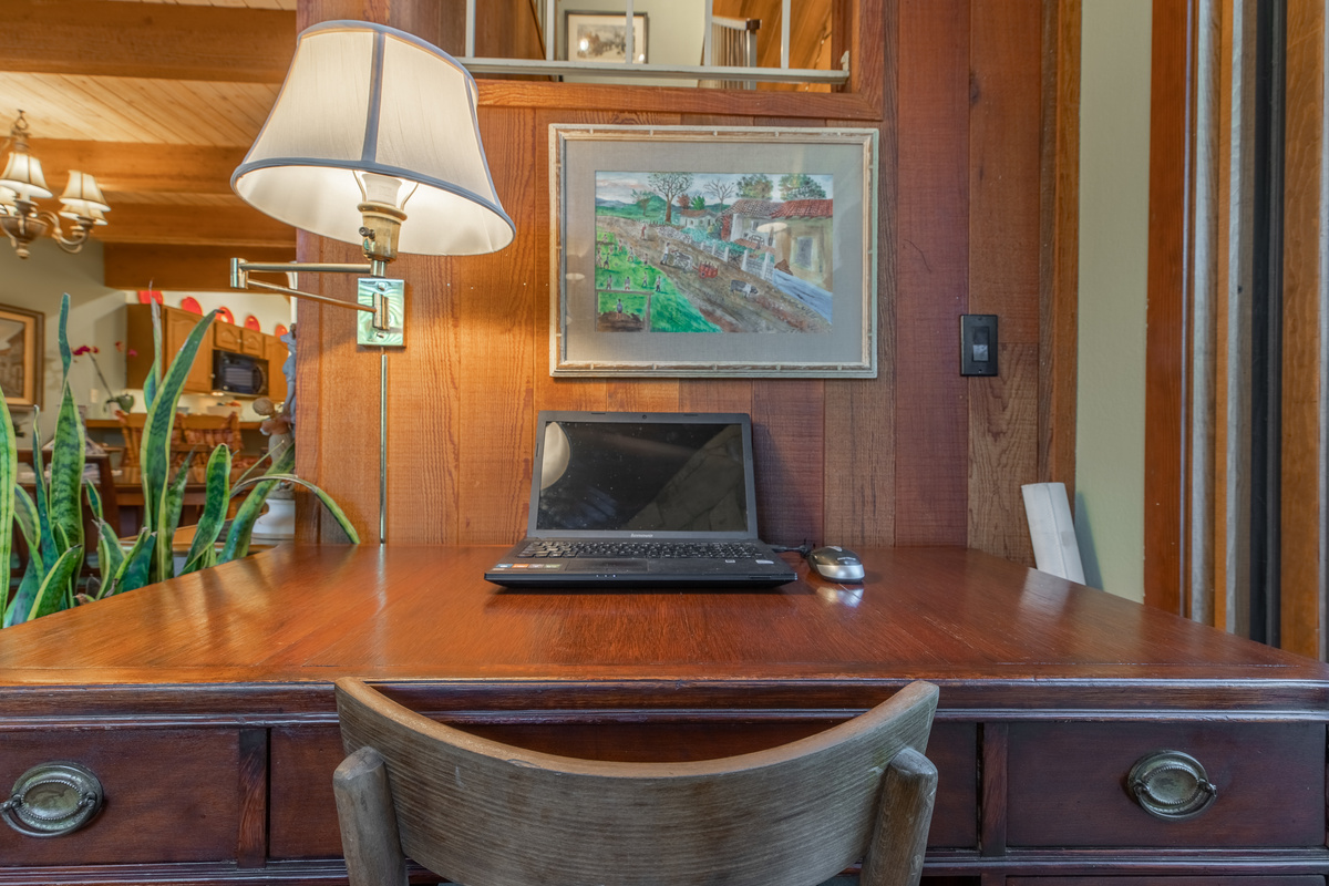 Dedicated workspace for quiet mornings or remote work.  There is a monitor you can use to connect your laptop.
