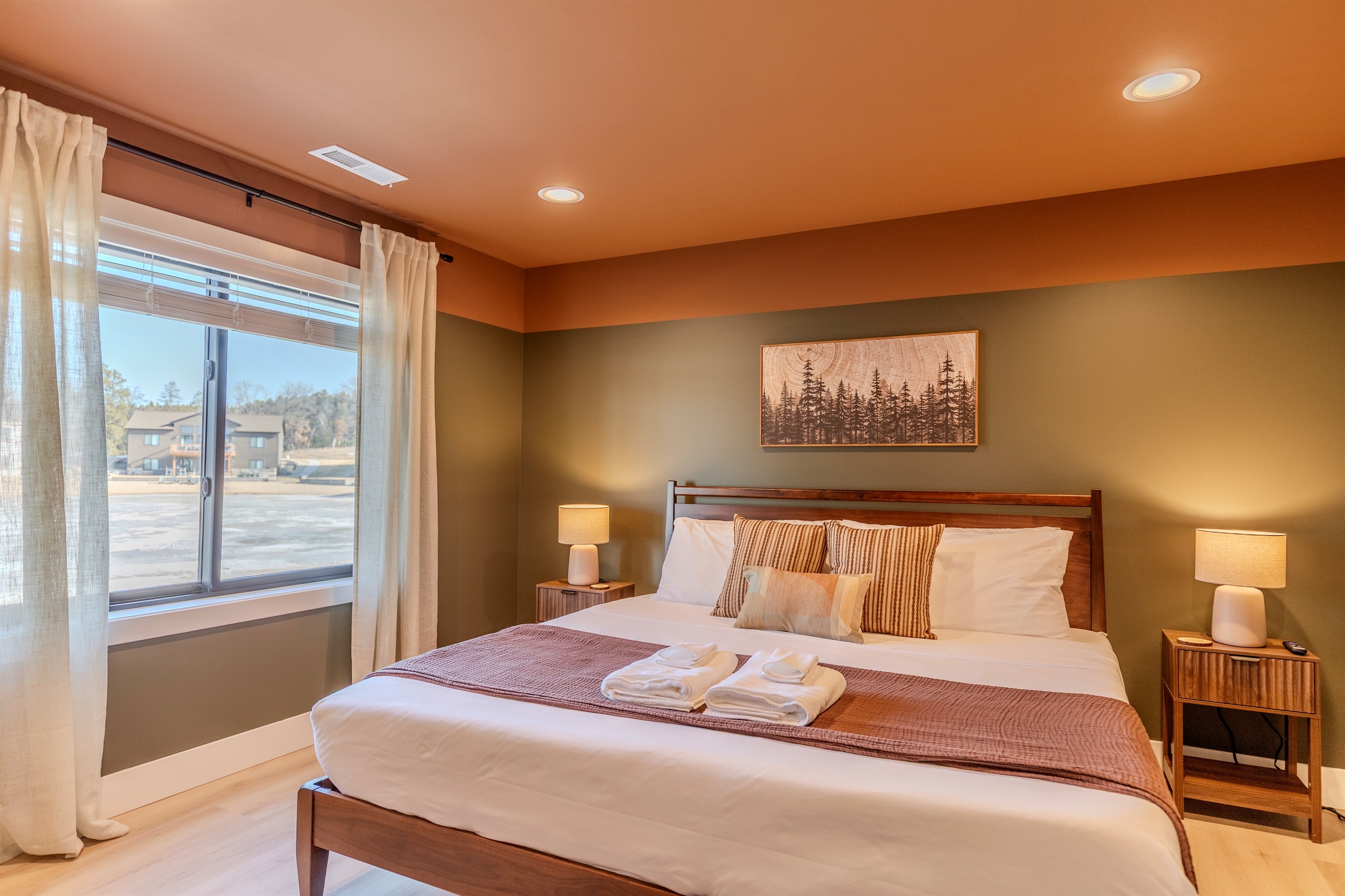 Downstairs king memory foam bedroom with Roku TV.