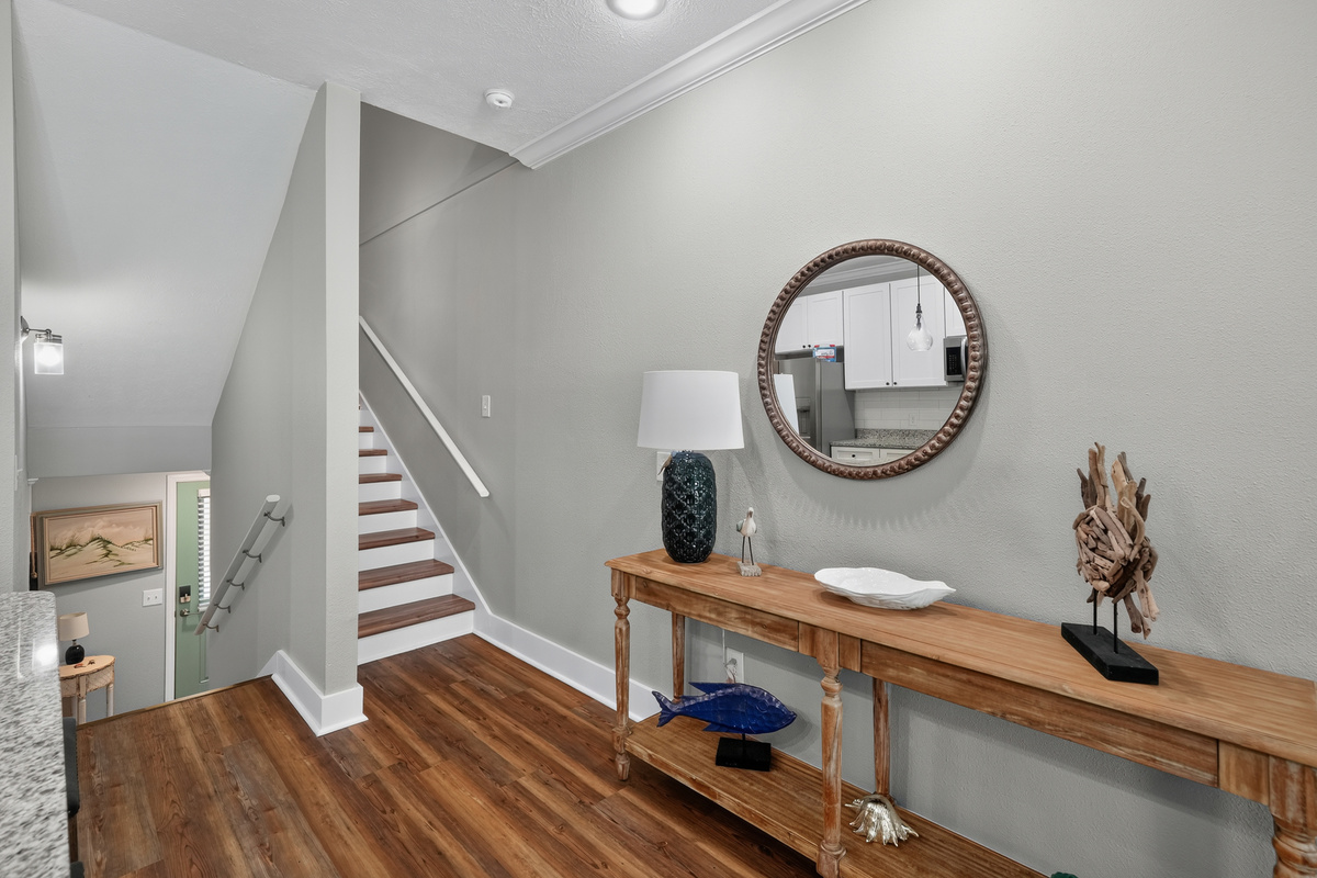 Head upstairs to the spacious open-concept kitchen and living room, thoughtfully designed for gathering, relaxing, and making memories together