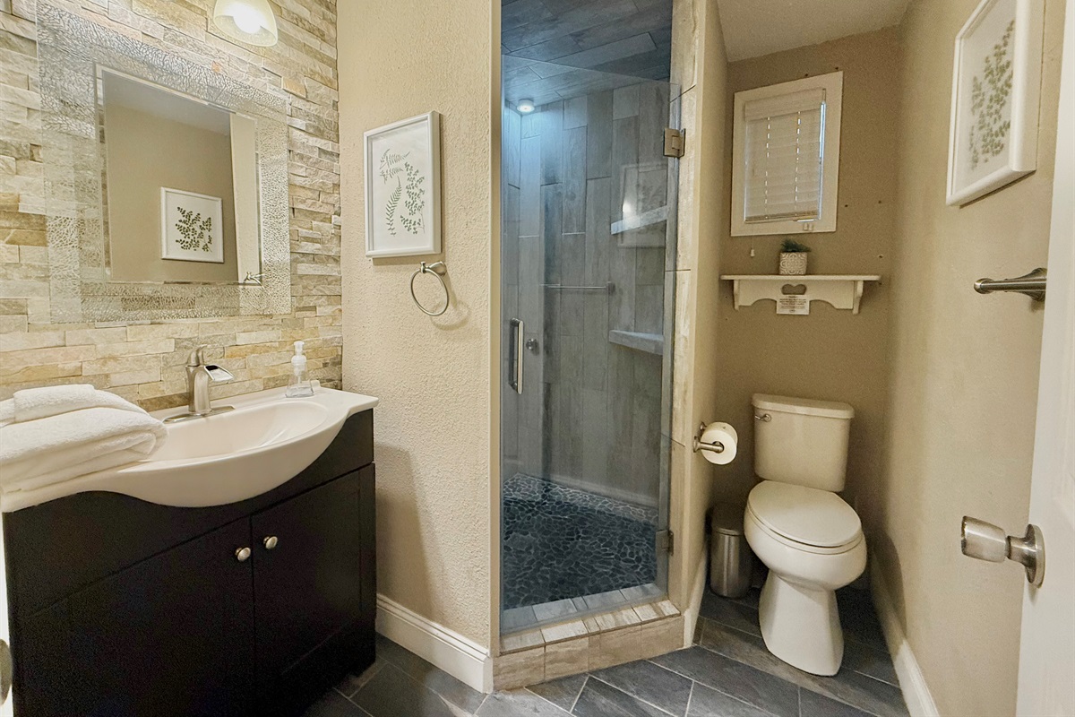 From the elegant wall textures to the stylish vanity and open shelving, every detail has been designed with your comfort in mind.