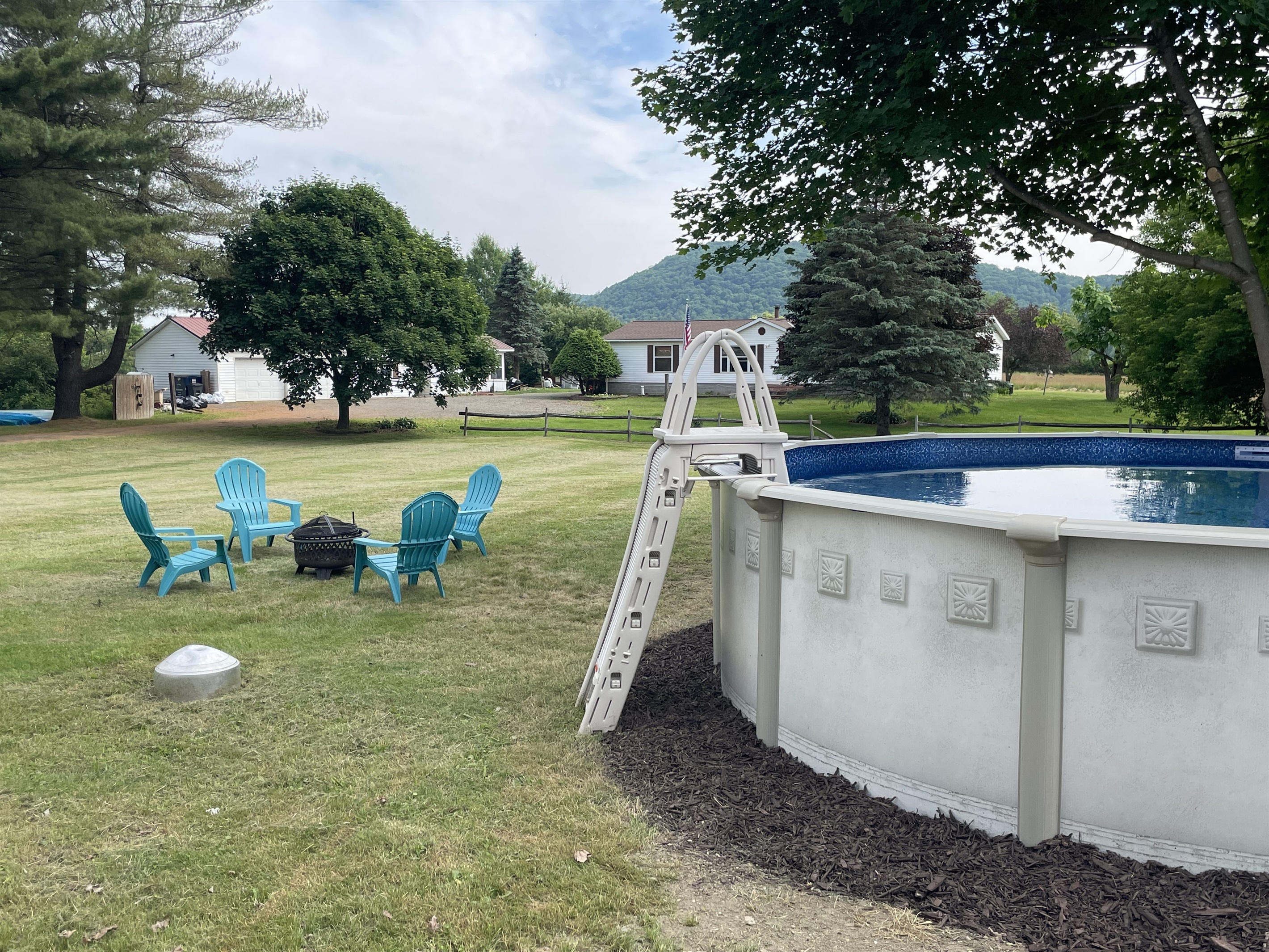 Above ground pool and firepit