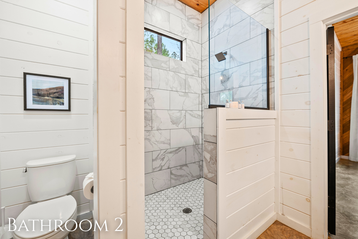 Chic and streamlined, this bathroom offers the perfect place to refresh after a day exploring the great outdoors.