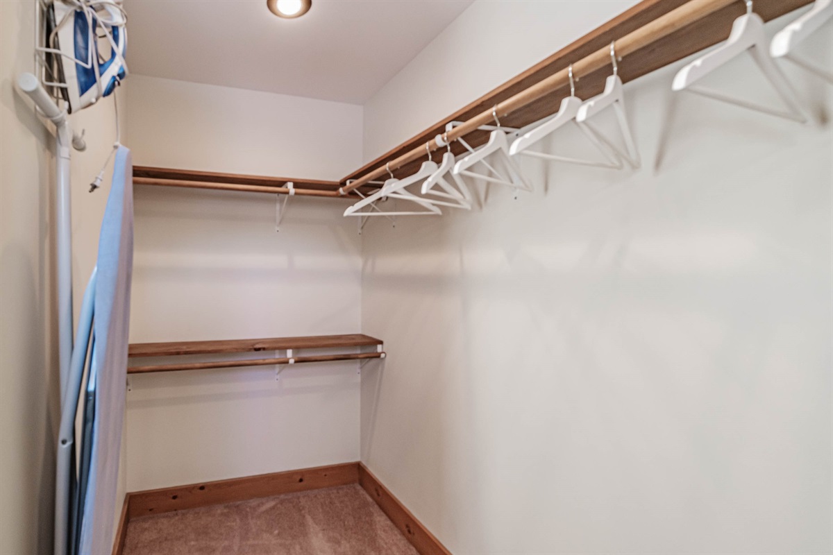 First-floor master with king bed, ensuite bath, and walk-in closet.