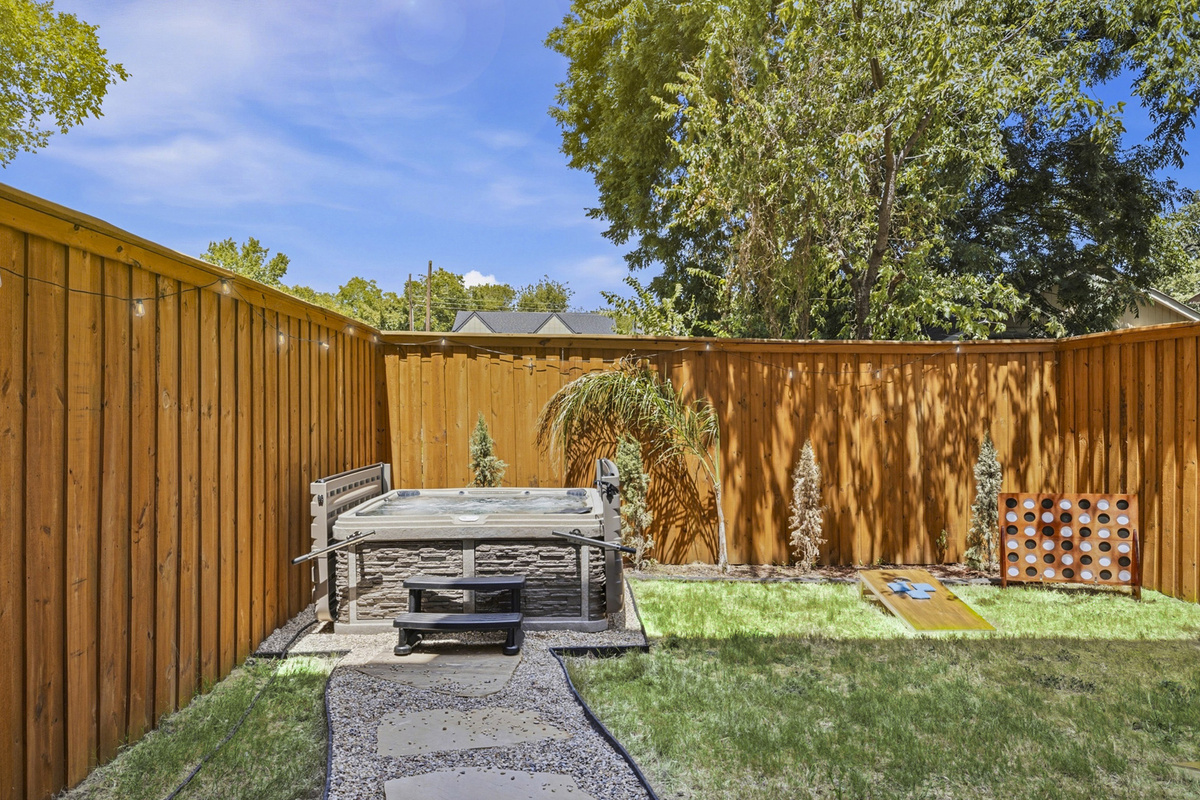 Unwind in a private yard with a hot tub and fun games under the Texas sun!