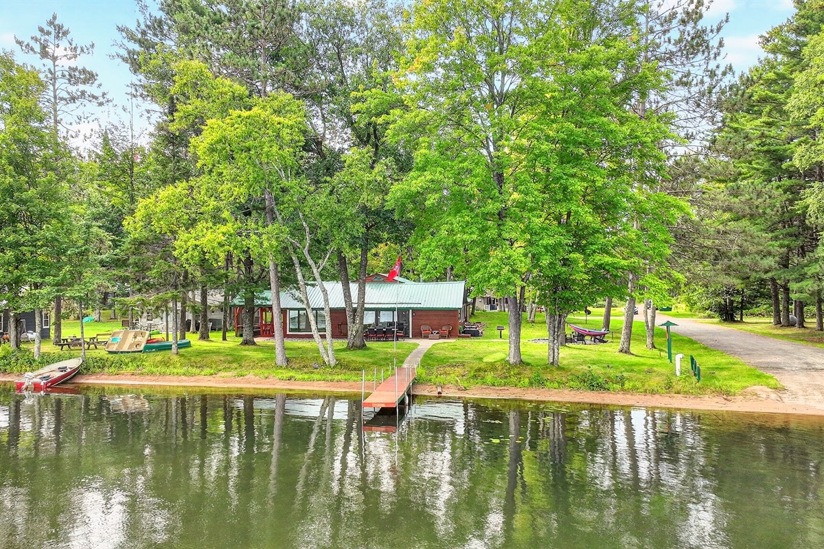 The home has a large, park-like yard situated directly next to the public boat launch for easy access. The home has a private dock for fishing or docking your boat.