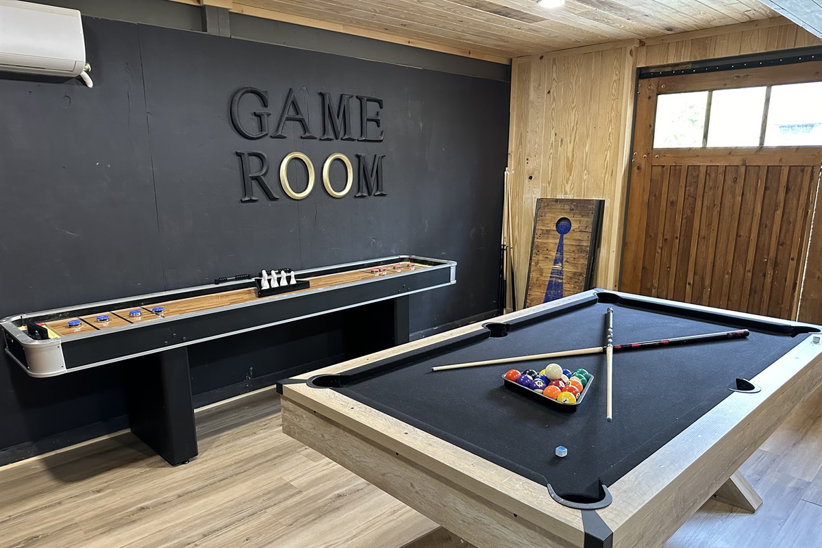 GAME ROOM! This game room has a Pool Table, Shuffleboard, Dart Board, Arcade!!
