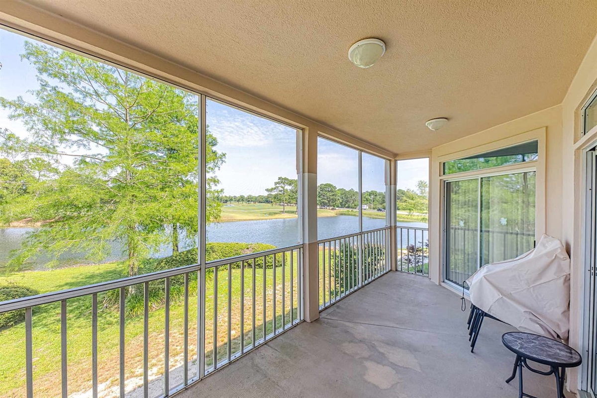 Screened Balcony: Enjoy serene water views and fresh breezes while sipping your morning coffee!