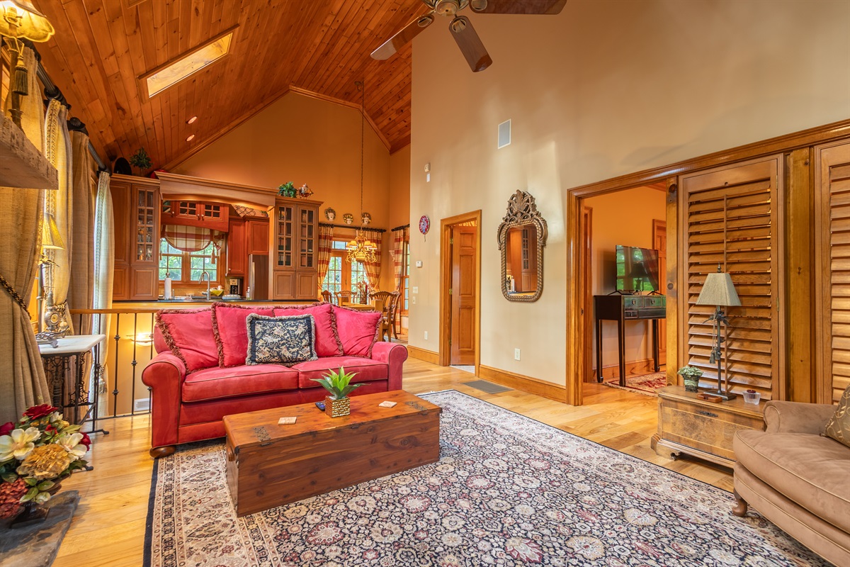The open-concept living space blends cozy comfort with upscale mountain charm, offering plenty of room to gather, unwind, and enjoy the peaceful surroundings.