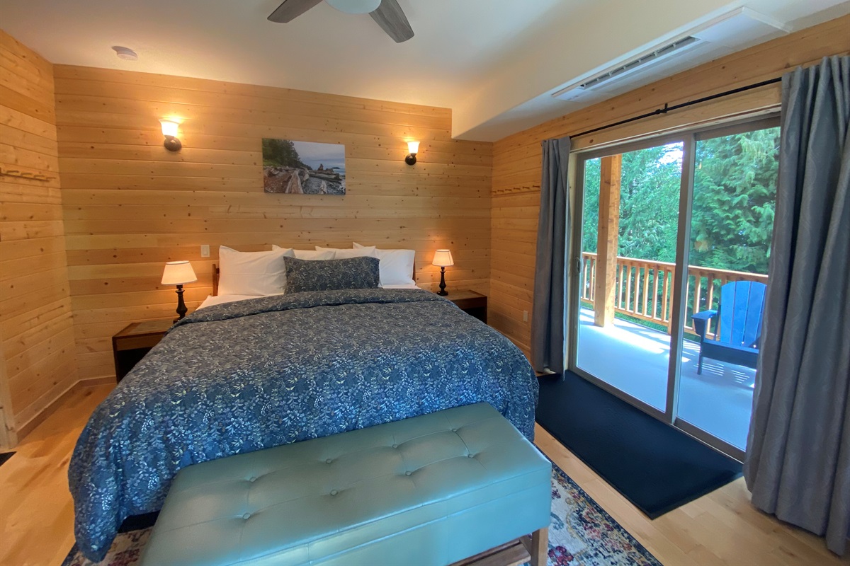 The Primary retreat is a gorgeous getaway that shares access to the expansive wrap around porch.