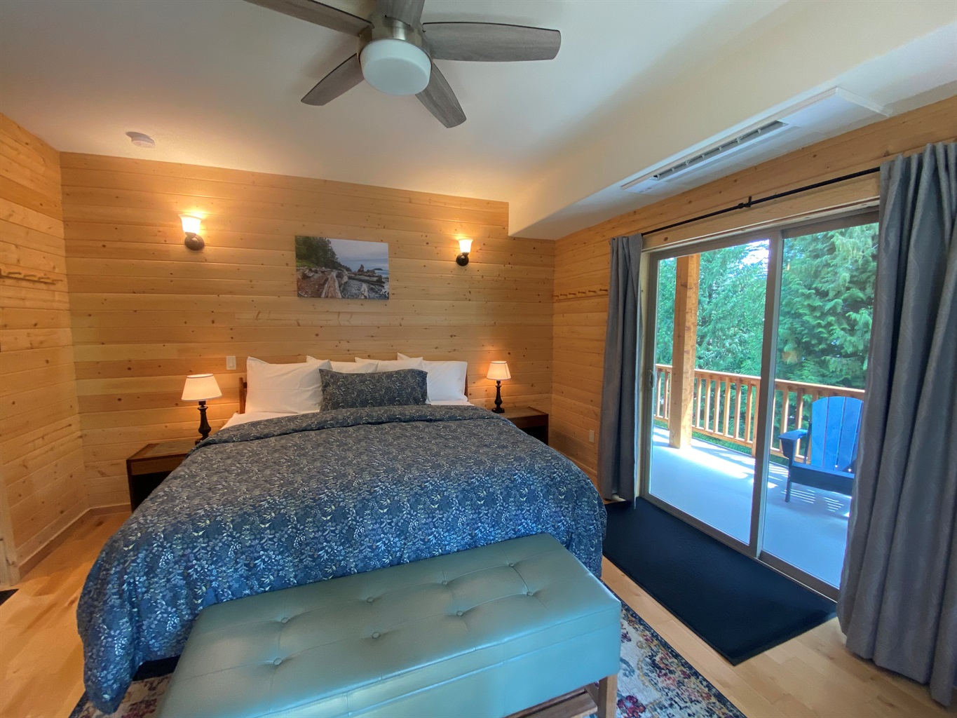 The Primary retreat is a gorgeous getaway that shares access to the expansive wrap around porch.