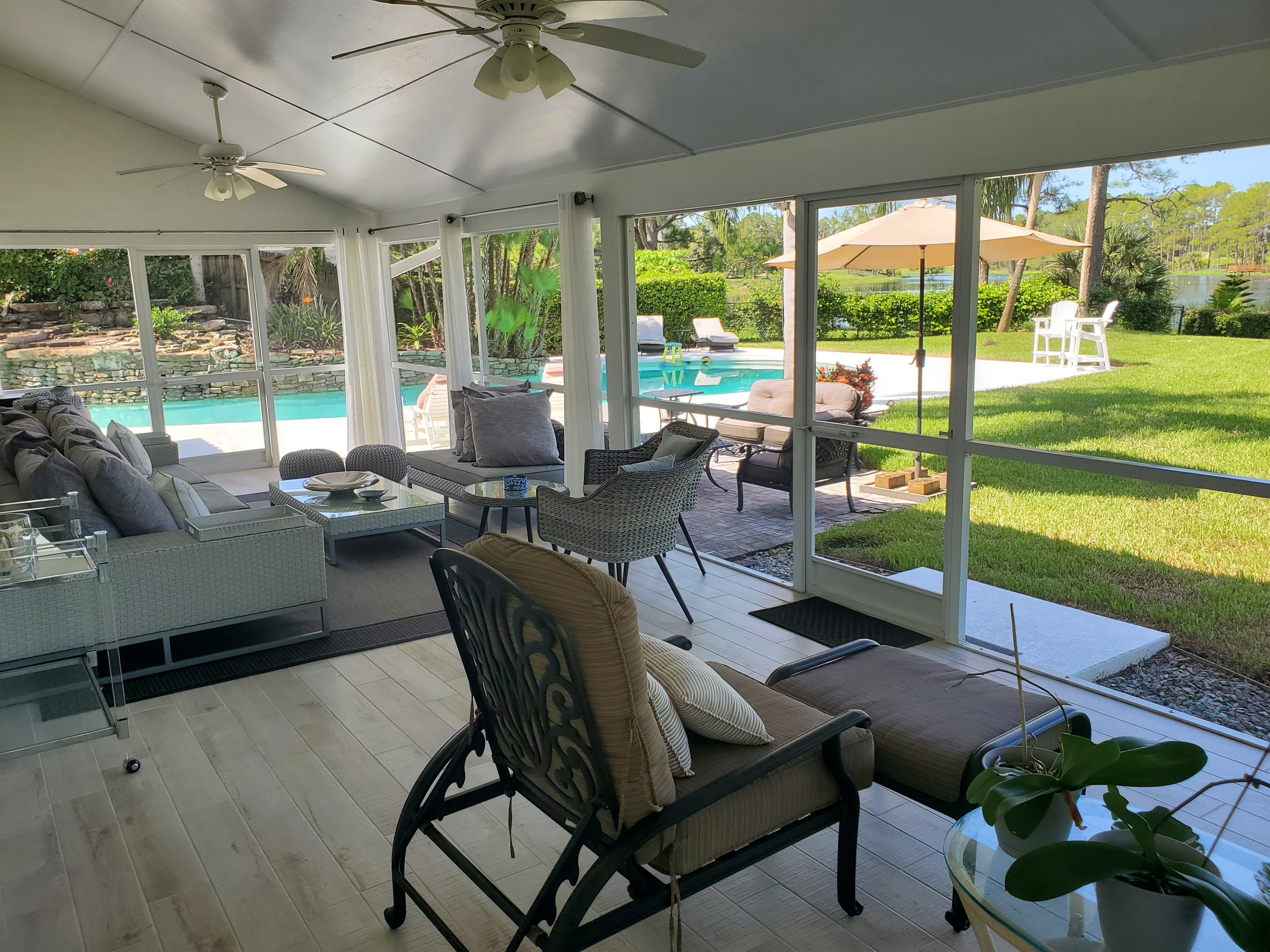 View of Lanai loungers, extra seating and patio furniture