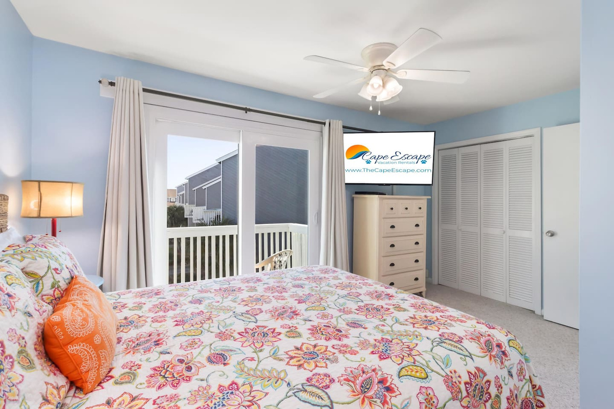 Your queen suite has closet storage, a large smart TV, and private balcony access &mdash; guests in this room won't want to leave.