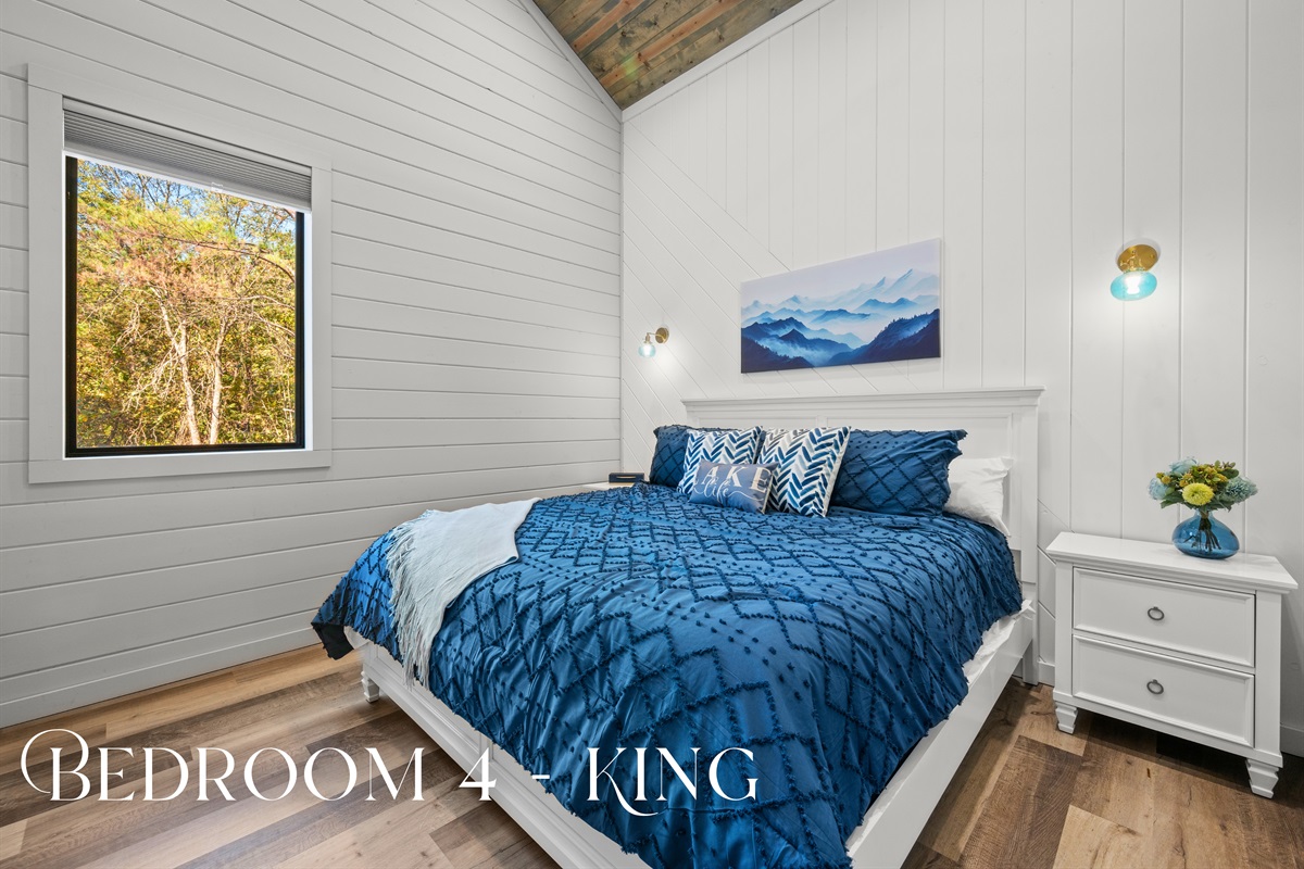 This airy king bedroom offers plush bedding, soft tones, and a calming environment that encourages deep rest.