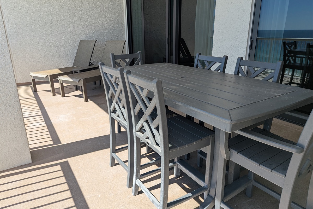 Patio is oversized with brand new coatings, exterior paint, and railings.