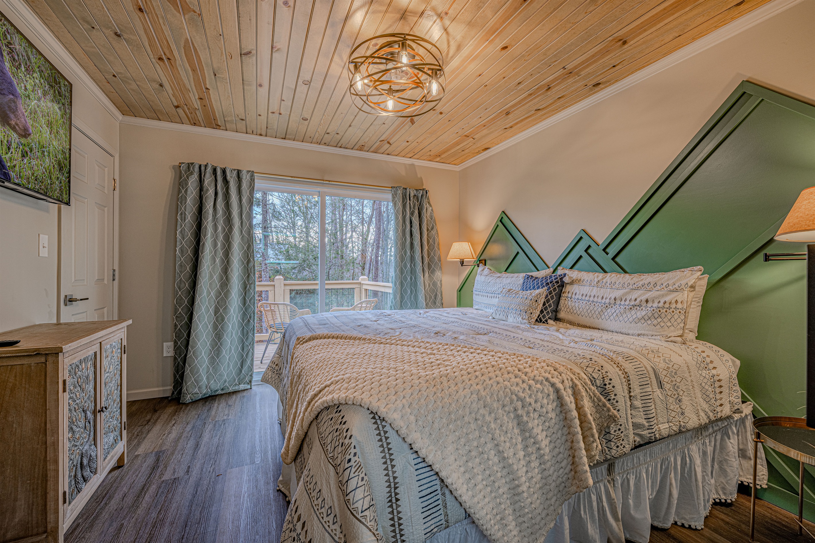 Comfort with a view. Enjoy your favorite shows from the plush King bed, then step out onto your private outdoor space.