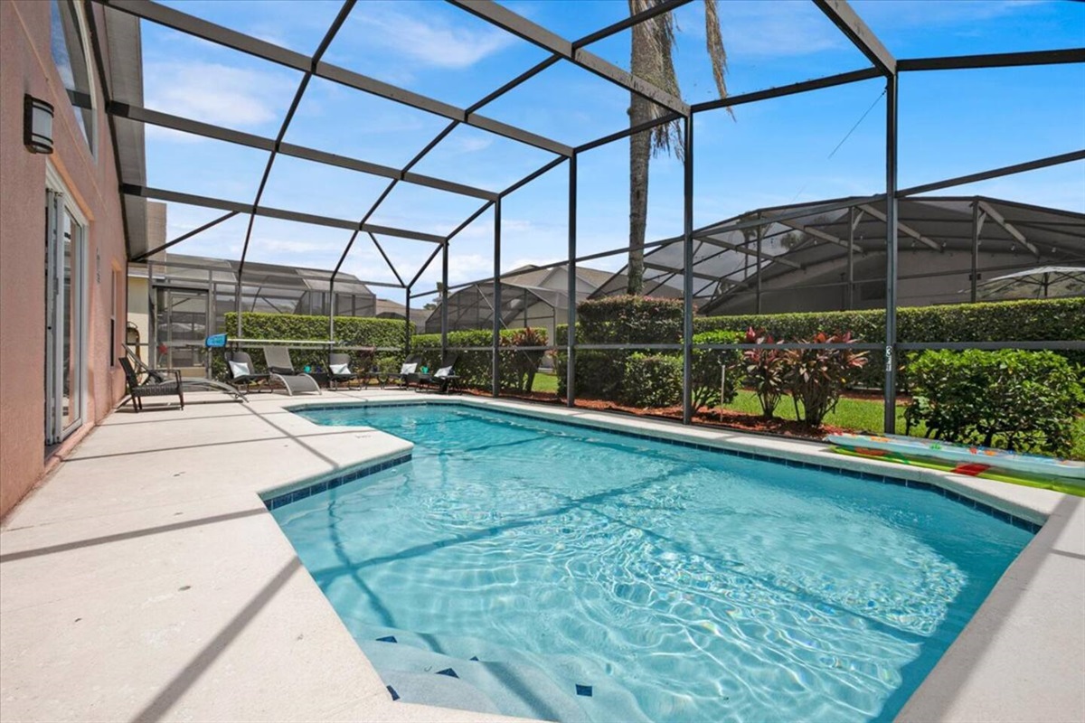 The outdoor pool has plenty of space for you to lounge and relax after a long day at the parks.