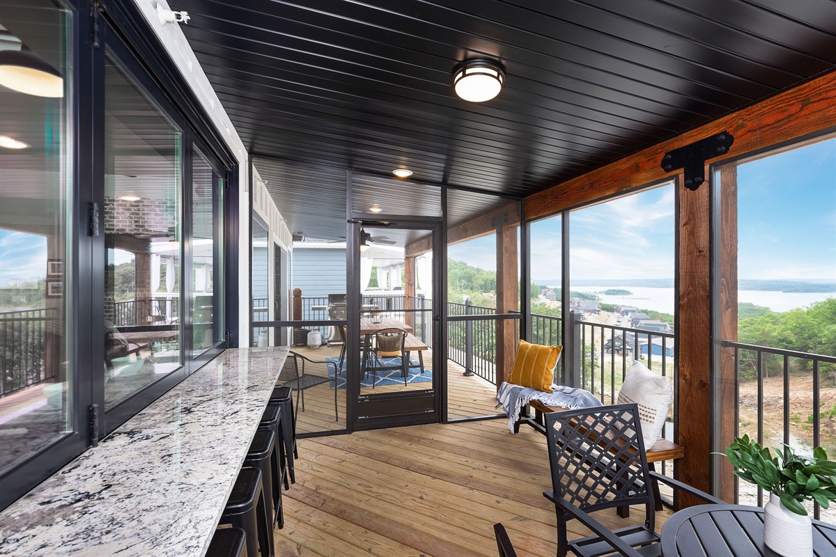 Main Level Screened in Deck w/folding window and lakeview