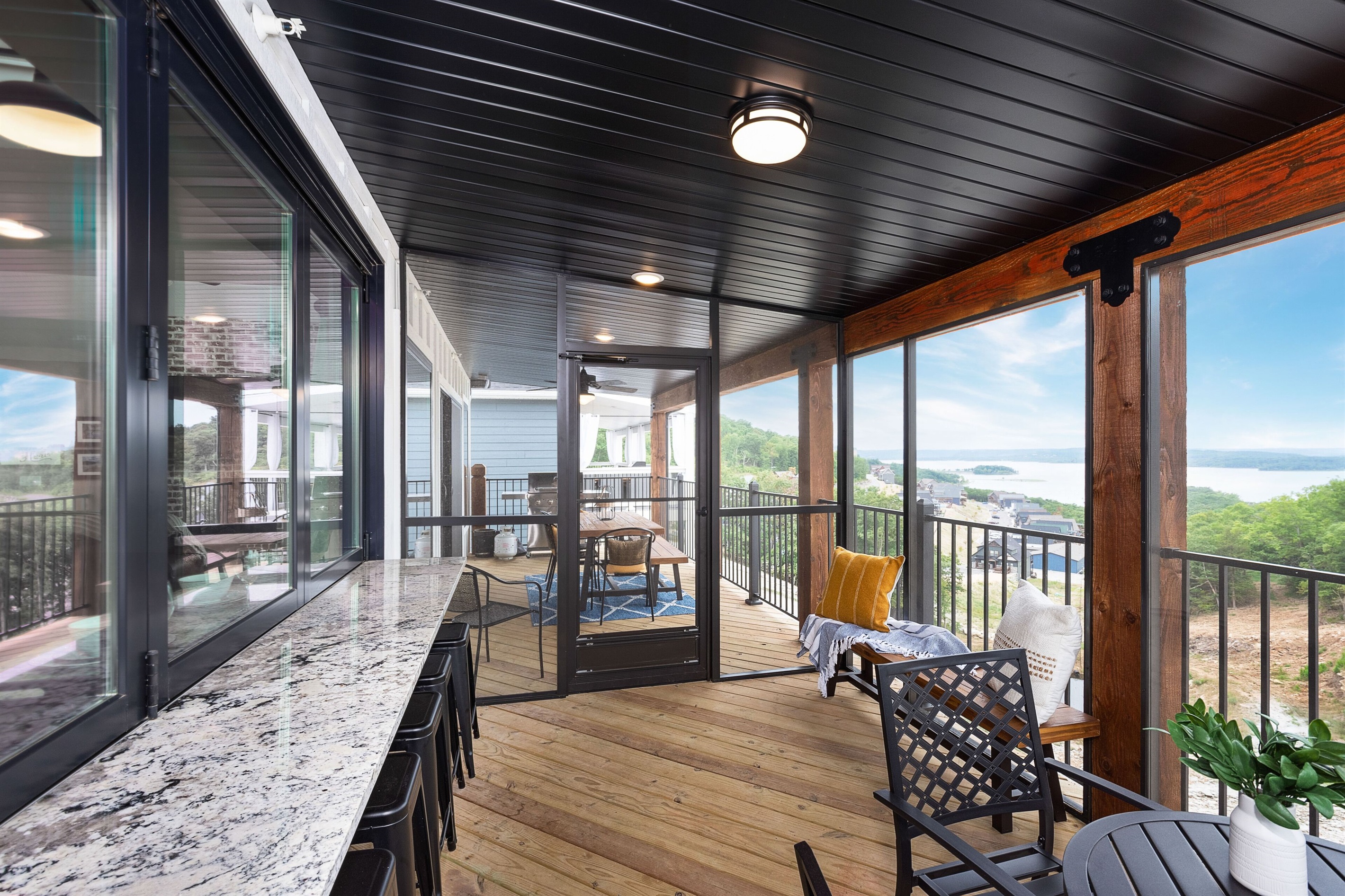 Main Level Screened in Deck w/folding window and lakeview