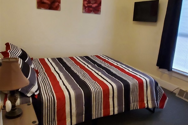 1 of 3 bedrooms all with Queen beds