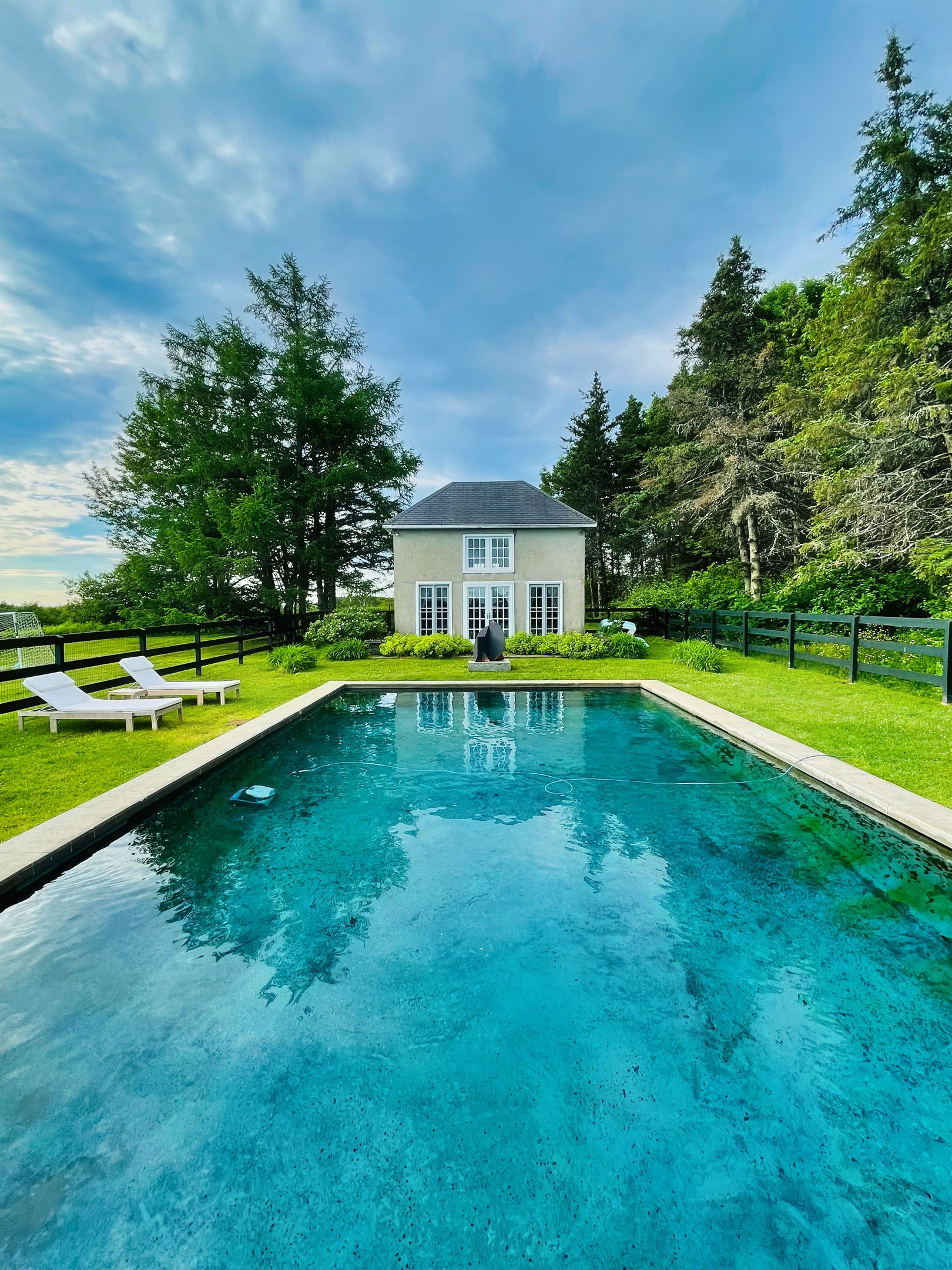Hawk Field Pool House overlooking the fenced in pool. The pool is open Memorial day - October 1. 