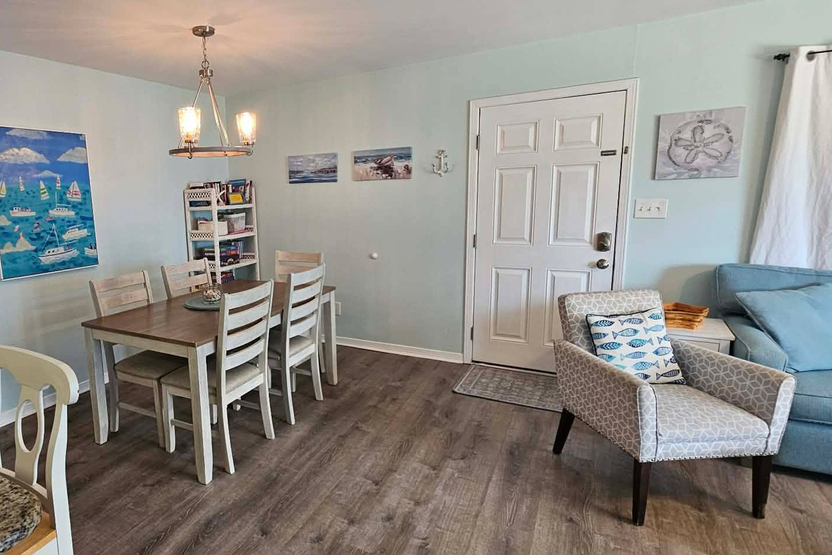 Dining area. 5 seats at the table. 3 seats at the counter bar. 1 highchair if needed is available.