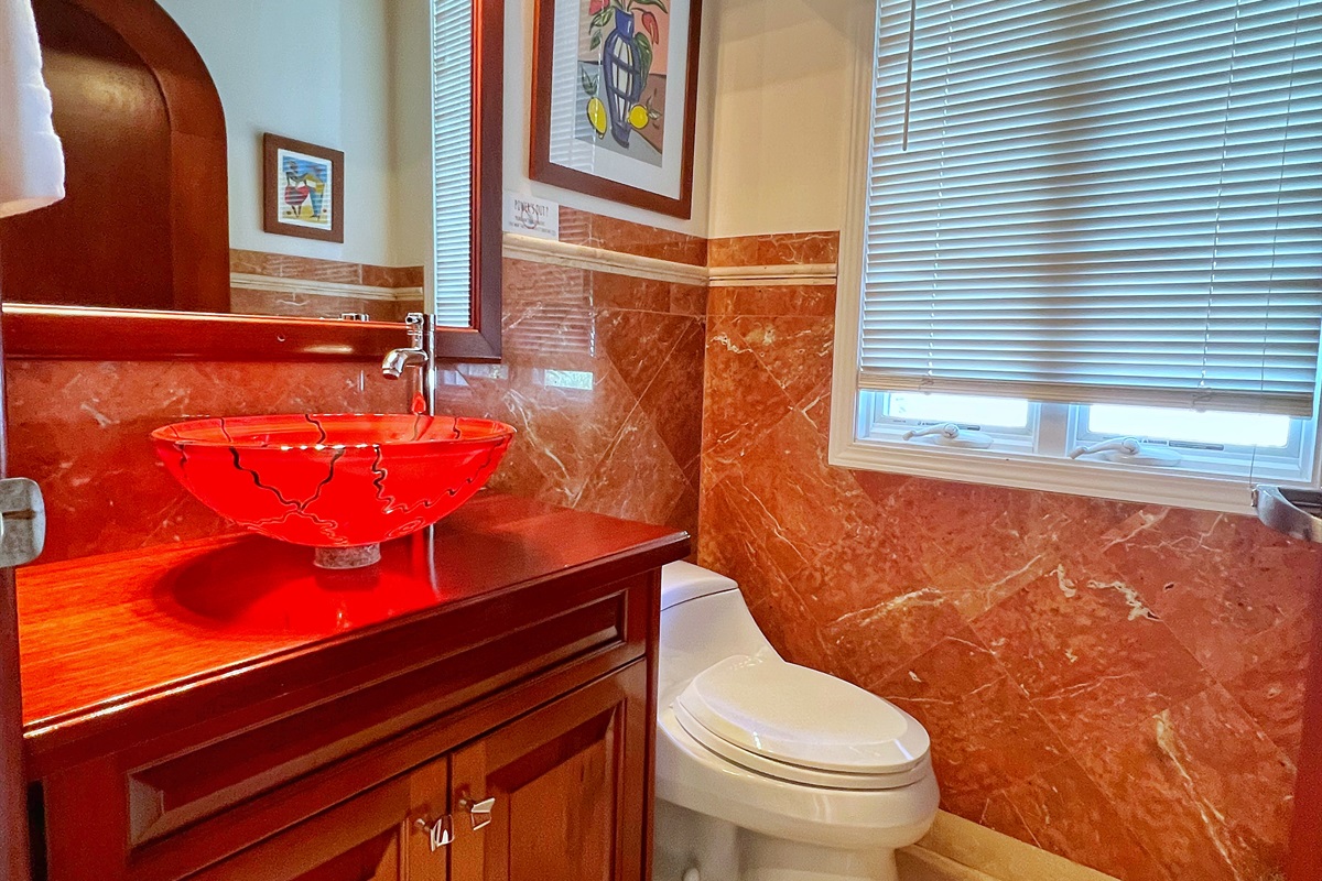 This half bathroom is on the main floor right by the two main floor bedroom suites.