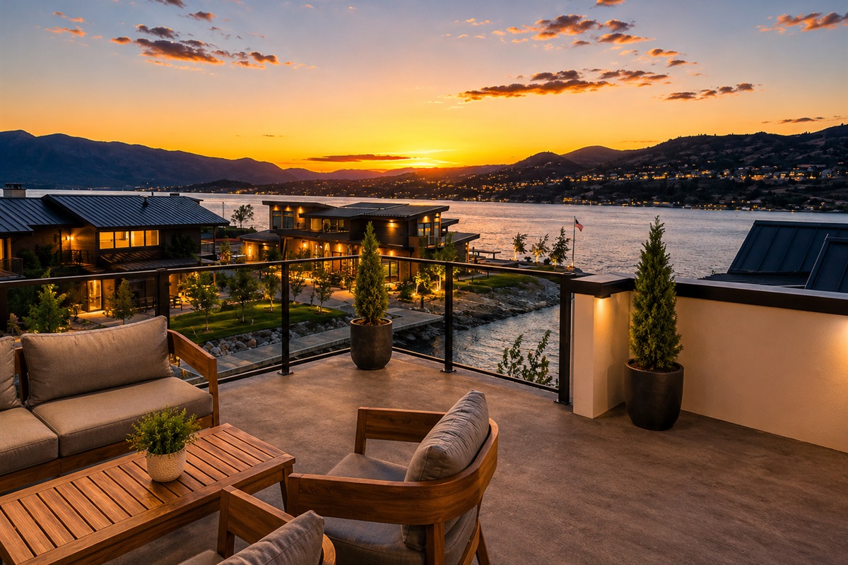 Rooftop deck with lounge seating, fire table and dining table