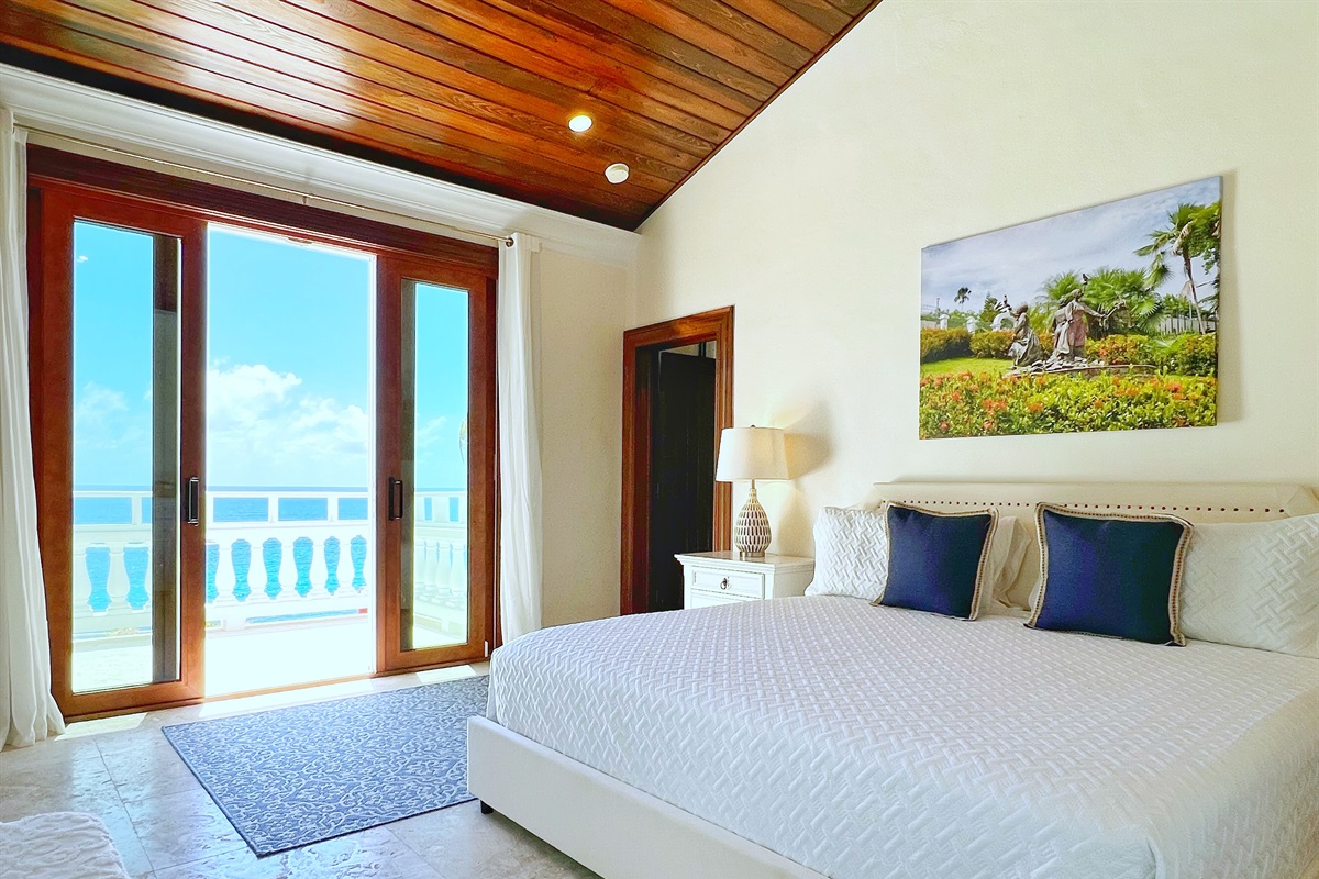 Bedroom 1&rsquo;s balcony offers tranquil ocean views to wake up to.