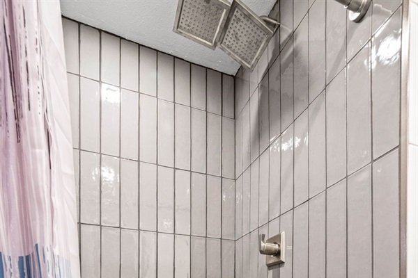 Rainfall Bliss: A luxurious bathroom with an overhead shower, offering a soothing, rainfall-like experience for a spa-like retreat at home.