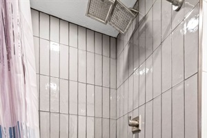 Rainfall Bliss: A luxurious bathroom with an overhead shower, offering a soothing, rainfall-like experience for a spa-like retreat at home.